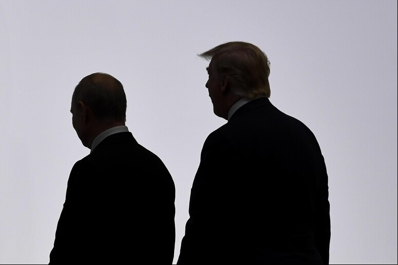 Trump e Putin durante o G20 de Osaka, no Japão, em 2019 - TODOS OS DIREITOS RESERVADOS
