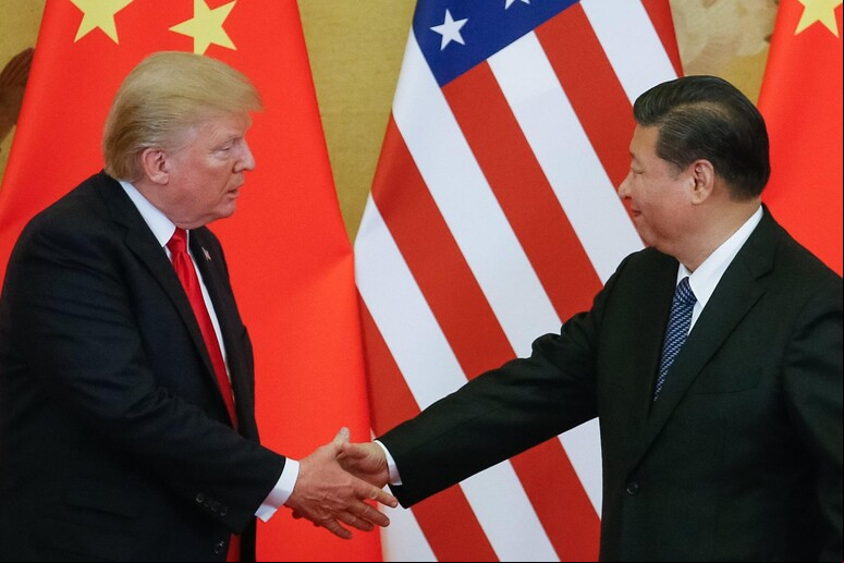 O presidente dos EUA, Donald Trump, e seu homólogo chinês, Xi Jinping - TODOS OS DIREITOS RESERVADOS